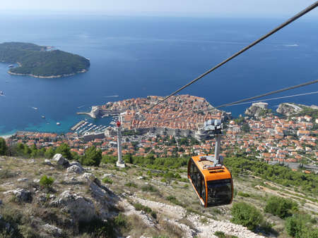 Dubrovnik, Croatia - August 4 2018: cable car reaching top of mountain above Dubrovnikのeditorial素材