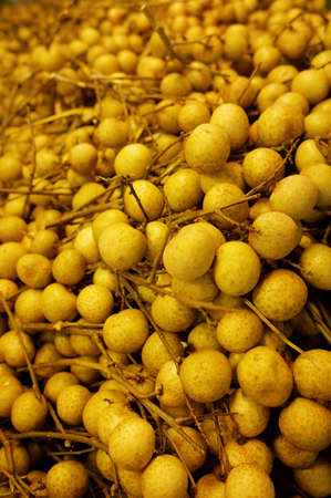 A big pile of longans ready for sale                の写真素材
