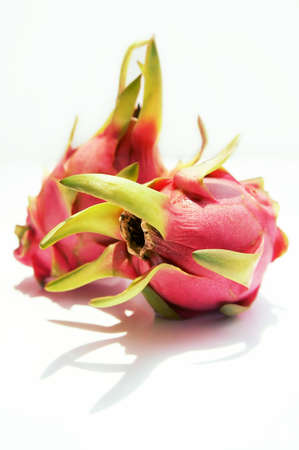A pair of Dragon Fruit on white background.                   の写真素材