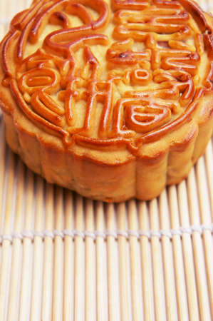 Close up of a Tradditional Mooncake supported by a mat                の写真素材