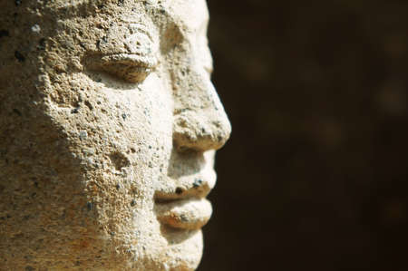 Side profile close up of Buddha face            の写真素材