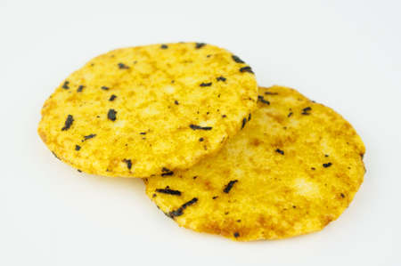 Two pieces of round golden cookiesの写真素材