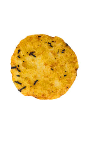 A single round golden cookie with isolated backgroundの写真素材
