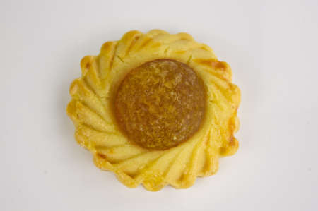 Top view of one Chinese festive Pineapple biscuit on white backgroundの写真素材