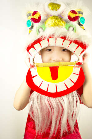 Boy New Year celebration with Lion Danceの写真素材
