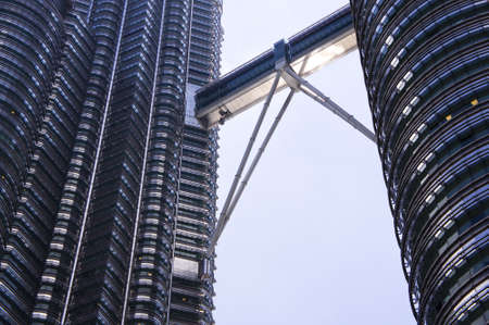 KUALA LUMPUR â Side view close up of the Petronas Twin Towers on Feb 28 2012, in Kuala Lumpur, Malaysia has the world's tallest twin towers. The skyscraper height is 451.9m のeditorial素材