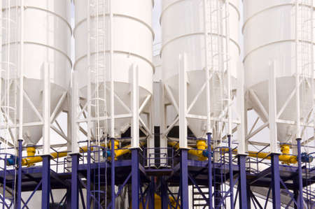 Front shot of four Industrial chemical processing Tanks の写真素材