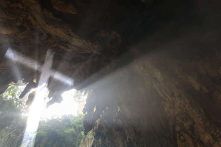 An illusional Christian Cross appear inside a cave.の写真素材