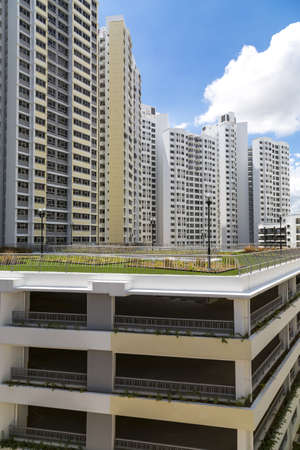 A new housing estate with a multi storey carpark with the garden on the roof 