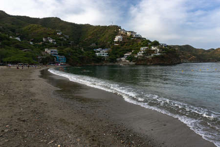 sea coast in bay of Taganga with mountainsの写真素材