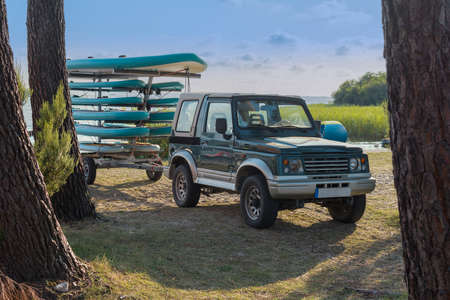 Trailer with kayaks and paddles