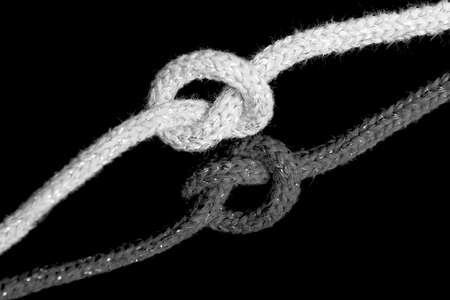 Rope knot and its reflectionの写真素材