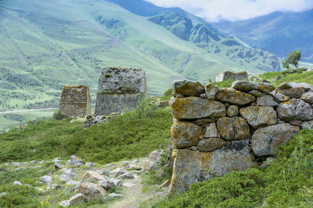Ruins of abandoned stone house in the mountainsideの写真素材