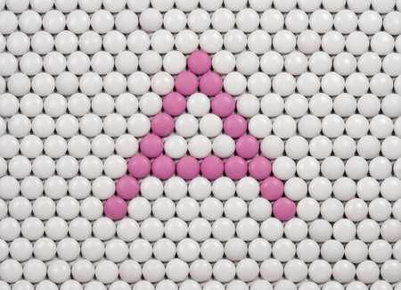 Vitamin A made of tablets on background of pills