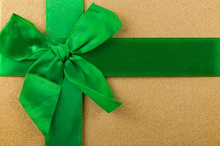 abstract background with green ribbon, green bow, Christmas background, Christmas giftsの写真素材