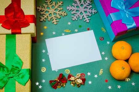 Christmas still life, tangerines, boxes with gifts, Christmas background, label, picture, Christmas card, new yearの写真素材