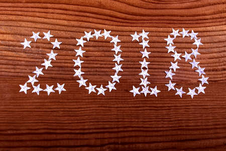 the inscription 2018 stars on a wooden background, Christmas, new year, two thousand eighteen (1)の写真素材