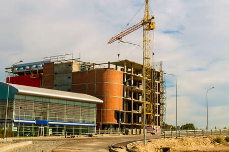 tower crane at the construction site of a multistory building