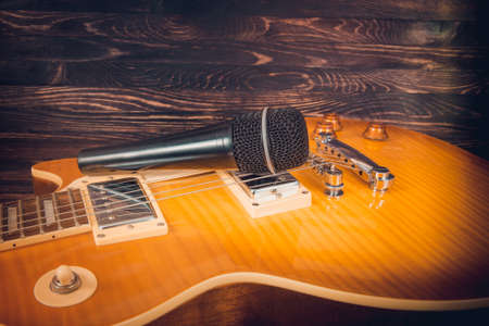 sunburst guitar and microphoneの写真素材