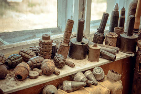 Various ammunition of the second world war lie on the tableの写真素材