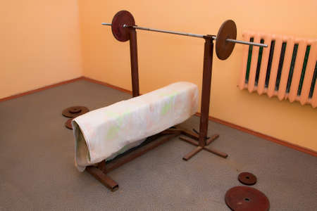 Barbell with weights is on the stand. Simulators. Bodybuilding powerlifting.の写真素材