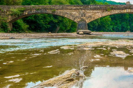 The old brick bridge across the river, the bridge of stoneの写真素材
