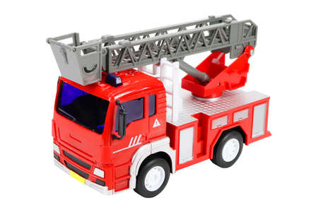 Red toy fire truck, on a white background, isolated image