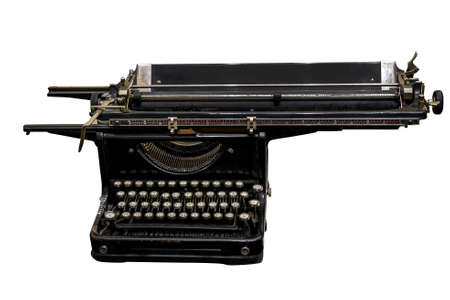Vintage black typewriter isolated on white backgroundの写真素材