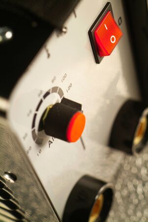 Close-up of an industrial switching button on control panelの写真素材
