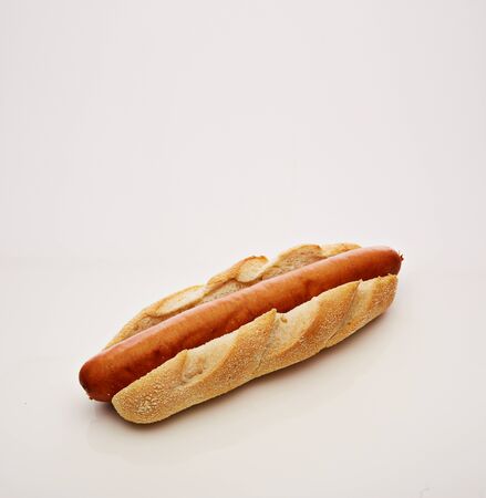 Shot of a hot dog with big sausage isolated on a white backgroundの写真素材