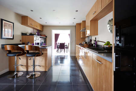 Shot of a modern and stylish luxury kitchen in an apartmentの写真素材