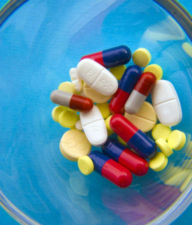 Pills in a glass cupの写真素材