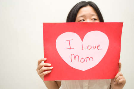 I love mom suspicious girlの写真素材