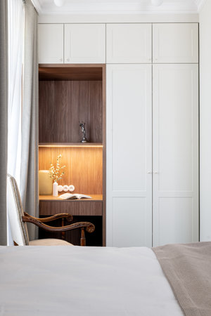 Furniture in a bedroom bed, chair, desk, wardrobe for comfort and styleの写真素材