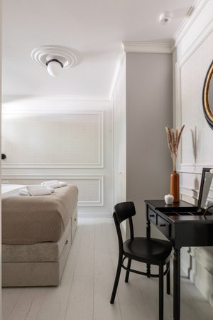 Room with bed, desk, chair, mirror for building interior designの写真素材