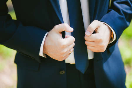handsome elegant young fashion man in classical costume suit and tieの写真素材