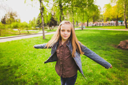 Free happy girl having fun outdoors. Freedom concept.の写真素材