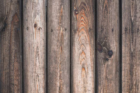 Vintage wood background. Grunge wooden weathered oak or pine textured planks. Brown rustic fence.の写真素材