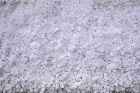 Hail background. Close-up of window-sill after hailstorm.の写真素材