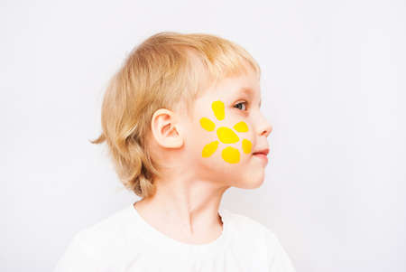 Little boy hands painted in colorful paints on whiteの写真素材