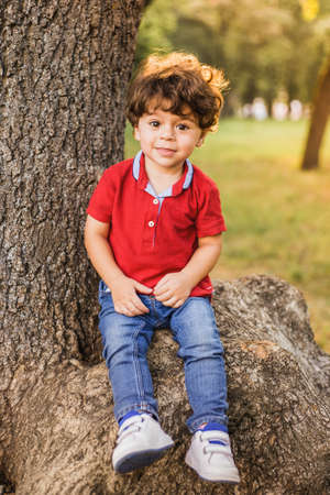 Little boy playing in the park. Portraitの写真素材
