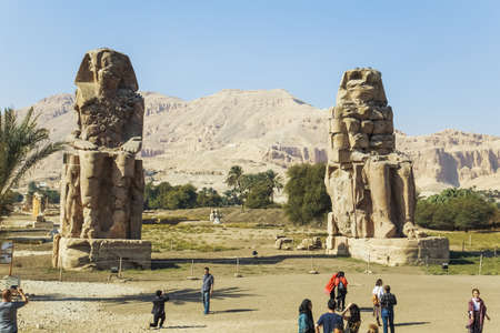 LUXOR, EGYPT - 15 JANUARY 2017: Ancient Colossi of  Memnon and tourists.のeditorial素材