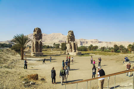 LUXOR, EGYPT - 15 JANUARY 2017: Ancient Colossi of  Memnon and tourists.のeditorial素材