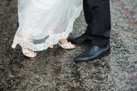 Just married happy wedding couple. Romantic moments of bride and groom on their wedding day. Horizontal color photography.の写真素材