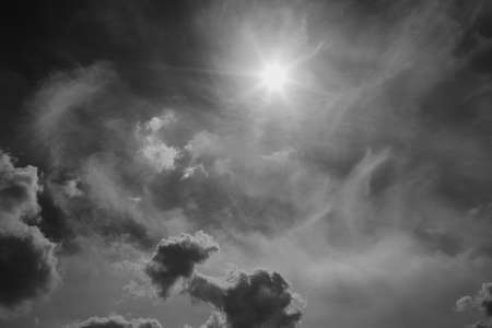 Beautiful scenic black and white picture of summer sunny cloudscape. Horizontal photography.