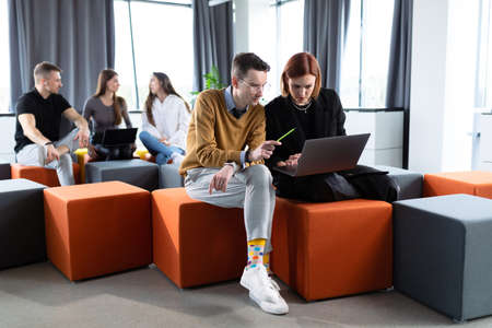 Colleagues discuss a business project in the office. Brainstormingの写真素材