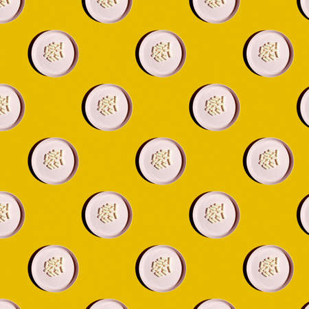 Top view of the pattern on the plastic plate in which the pills are. Vitamins, food supplementsの写真素材