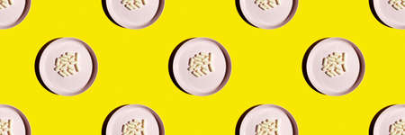 Top view of the pattern on the plastic plate in which the pills are. Vitamins, food supplementsの写真素材