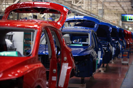 Car body after painting on the assembly lineの写真素材