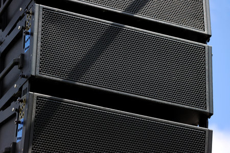 Professional sound speakers mounted for outdoor events